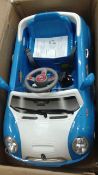Ride on Mini style car in blue with battery & remote- Ex Showroom -untested  looks unused with box