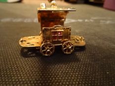 9 Carat Yellow Gold Gypsy Style Caravan Charm, Hinged to reveal fortune teller inside.