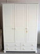 NEW Copenhagen 3 Door, 4 Drawer WardrobeÂ in attractive white MDF is a large triple wardrobe that