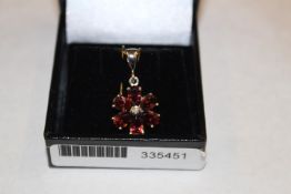 925 Ruby and Diamond Flower Pendant. \YM pin 2.5cm x 1.5cm - No VAT on this item