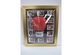 Signed boxing glove and collage 'Sugar Ray Leonard'. Supplied with certificate of authenticity.