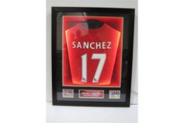 Signed football shirt 'Sanchez'. Supplied in a frame and with certificate of authenticity.