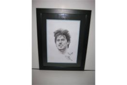 Signed picture - 'David Silva'. Supplied in a frame and with certificate of authenticity.