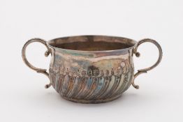 A Queen Anne silver twin-handled caudle