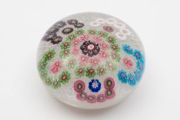 A Clichy glass paperweight: the muslin g