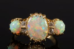 An 18ct gold, opal and diamond seven-sto