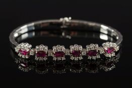 An 18ct white gold, ruby and diamond bra