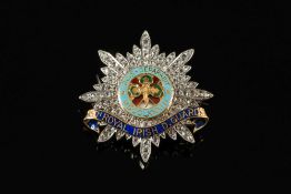 An enamelled gold and diamond mounted 'R