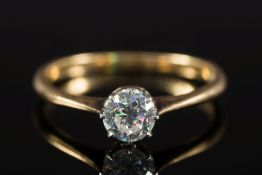 A gold and diamond single-stone ring: wi
