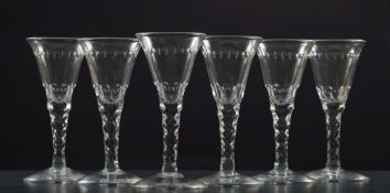 A set of six English wine glasses: each