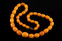 A graduated amber bead, single string ne