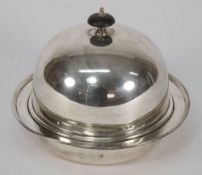 A George V silver muffin dish and cover,