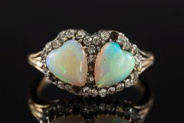 A gold, opal and diamond mounted double