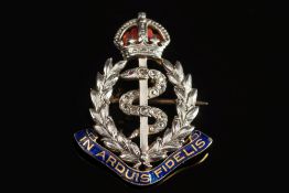 An enamelled and diamond mounted 'Royal