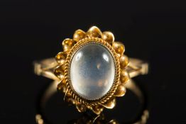 A 9ct gold and oval moonstone single sto