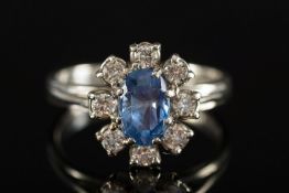 An 18ct white gold, sapphire and diamond
