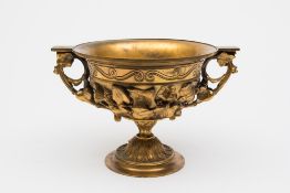 A gilt metal two-handled vase: of campan