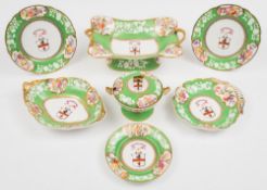 A Spode porcelain armorial dessert servi