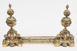 A pair of cast brass Continental andiron