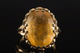 A 9ct gold and oval citrine single stone
