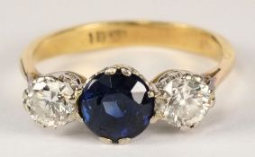An 18ct gold, sapphire and diamond three