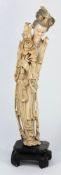 A Chinese carved ivory figure of Kuan-yi