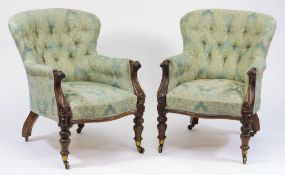A pair of Victorian carved rosewood armc