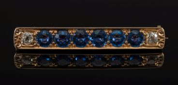 A sapphire and diamond eight-stone bar b