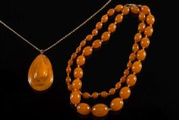 A graduated amber bead single string nec