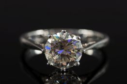 A white gold and diamond single-stone ri