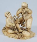 A Japanese okimono of two demons:, one s