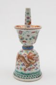 A Chinese famille rose altar candlestick