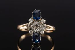 A sapphire and diamond mounted 'along th