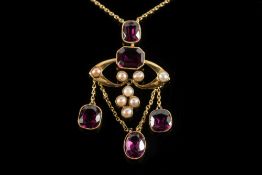 A garnet and seed pearl Art Nouveau pend