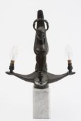 A bronze four- branch table lamp:, the c