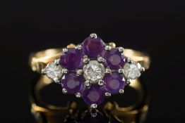 An 18ct gold, amethyst and diamond circu