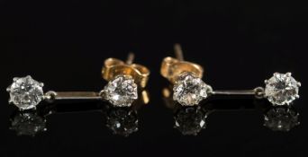 A pair of diamond two-stone drop earring