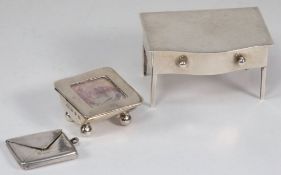 A George V silver stamp holder, maker's