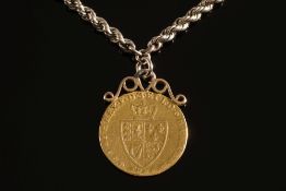 A Spade Guinea: mounted as a pendant on