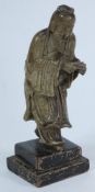 A Chinese carved soapstone figure of a s