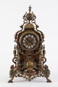 A French cast brass mantel clock: the ei