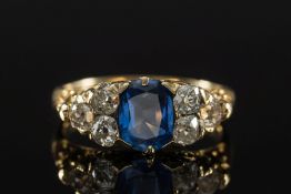 A sapphire and diamond seven-stone ring: