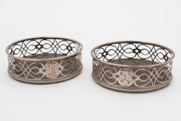 A pair of George III silver coasters, ma
