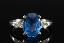 An oval sapphire single-stone ring:, the