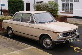 A 1972 BMW 2002 Touring two door sports