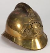 A French brass fire brigade dress helmet