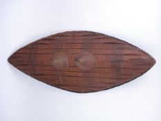 A Ugandan wicker shield:, of traditional