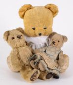 Three assorted pale plush teddy bears:.