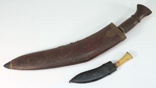 A Malayan kukri: and a smaller kukri:, b