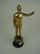 A brass Policeman car mascot:, with one